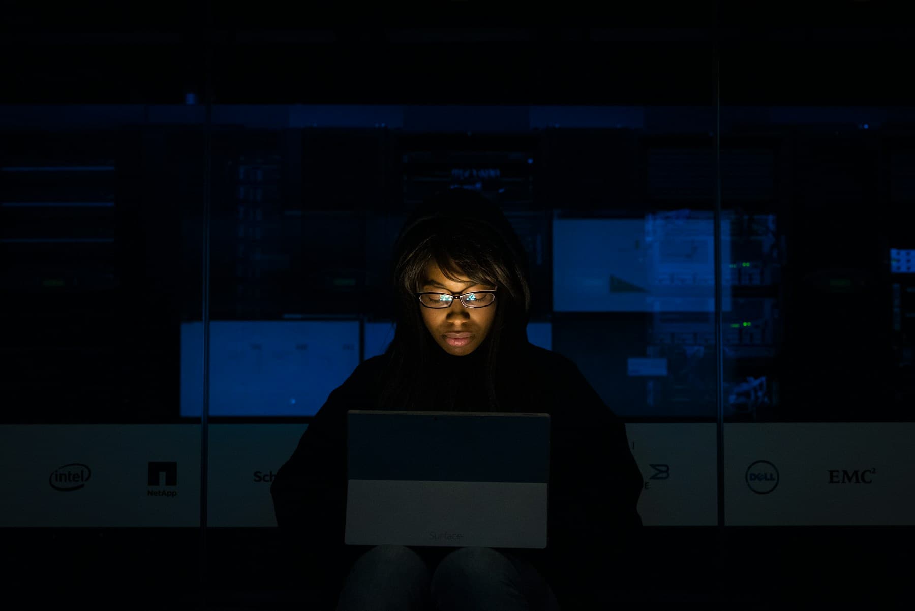 A recruiter reviewing applicant CVs on a laptop